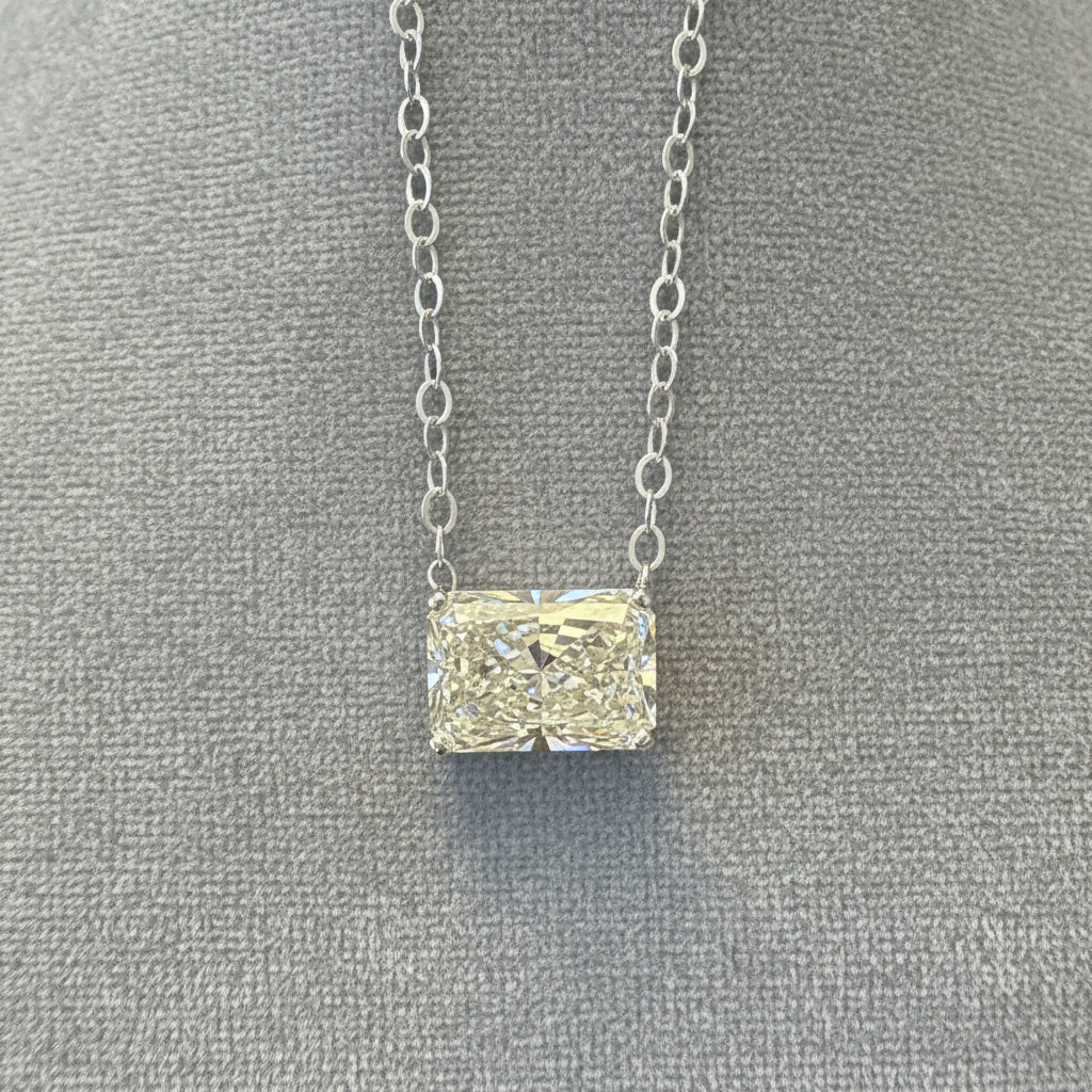 4.07 carat radiant cut diamond prong set in east/west orientation on a 2.2mm cable shain